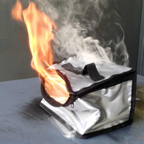 Lithium-ion battery fire containment test for portable electronic devices