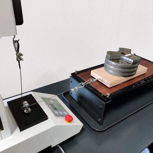 Coefficient of sliding friction test for aircraft surfaces